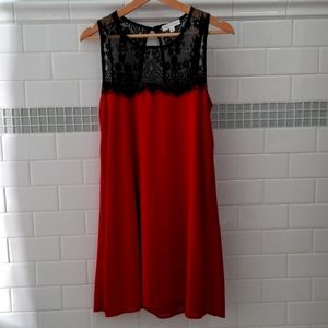 Socialite red dress with black lace detailing. Size Small.